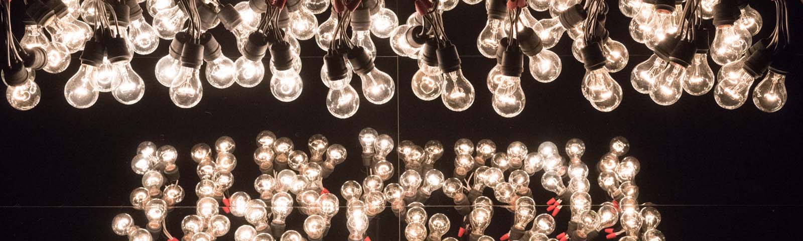 Close-up of a set of light bulbs on a black background